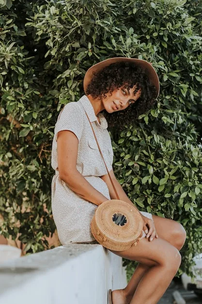A person wearing a stylish yet comfortable outfit made from sustainable materials. The outfit is accessorized with unique jewelry and shoes, reflecting personal style and individuality.