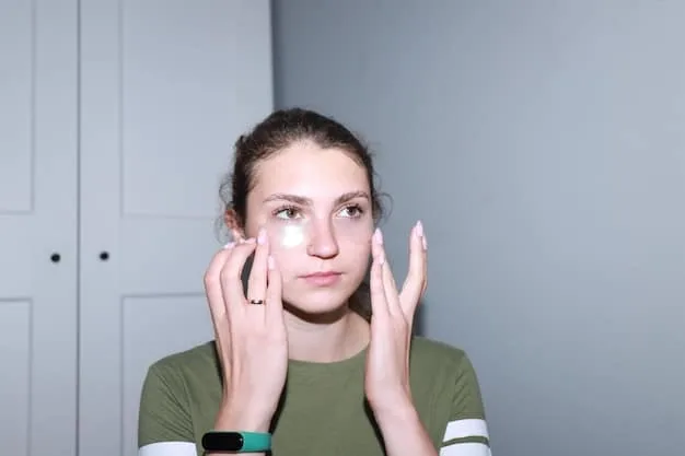 A woman gently applying eye cream under her eyes with her ring finger, demonstrating proper technique. The image highlights the texture of the cream and the delicate skin around the eyes.