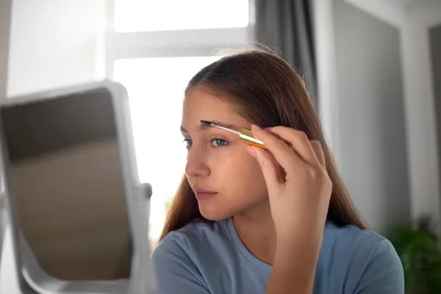 A person carefully placing a strip of false lashes onto their upper eyelid using tweezers. Their eye is partially closed, and they are looking into a mirror for accurate placement.