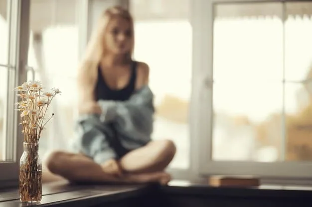 A serene image of a woman practicing yoga in a sunlit room, emphasizing mindfulness and personal well-being on a Sunday morning.