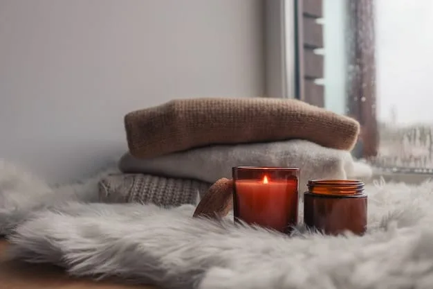 A cozy living room scene with soft lighting, a comfortable couch with plush blankets, and a lit aromatherapy diffuser emitting a gentle mist.
