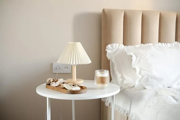 A bedroom with soft, neutral-colored bedding, gentle lighting from a bedside lamp, and a few carefully chosen decorative items, conveying a sense of peace and tranquility.