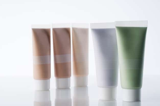 A neatly arranged set of four skincare products: a gentle cleanser, a targeted acne treatment serum, a lightweight moisturizer, and a broad-spectrum sunscreen. Each product has a minimalist label.