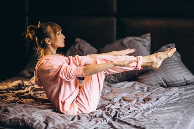 A woman is seen in a dimly lit bedroom, performing a gentle yoga stretch before bed. She is wearing comfortable pajamas and her movements are slow and deliberate, promoting relaxation.