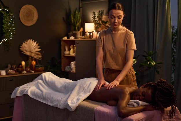 A person receiving a massage at a spa, with soft lighting and calming ambiance. The focus is on the relaxed expression of the person and the professional care being administered.
