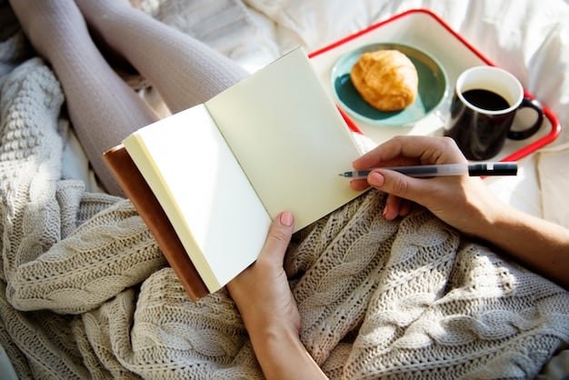 A close-up shot of a person's hands writing in a journal on a Sunday morning, with a cup of tea and a cozy blanket nearby, emphasizing intentionality and planning for the week ahead.