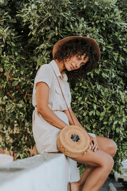 A person wearing a stylish yet comfortable outfit made from sustainable materials. The outfit is accessorized with unique jewelry and shoes, reflecting personal style and individuality.