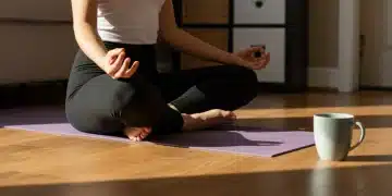 Woman meditating on Sunday morning, embodying self-care and relaxation